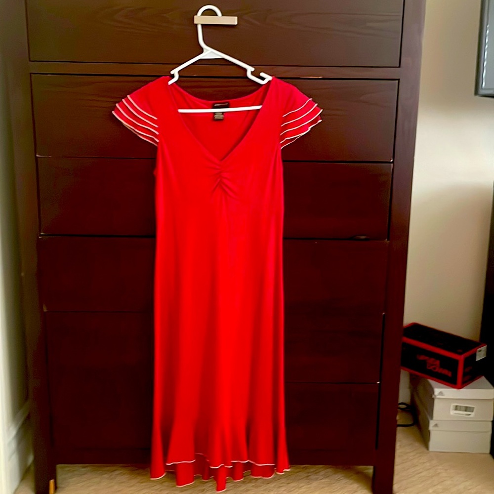 Red dress with flouncy sleeves and ruffled/trim bottom- hits calf level